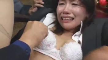 Chained Asian submissive being screwed by canines on webcam