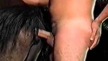 Farmer with loaded boner hardly bangs a sexy black horse from behind