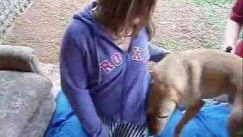Little canine mounting a snug human vagina outside