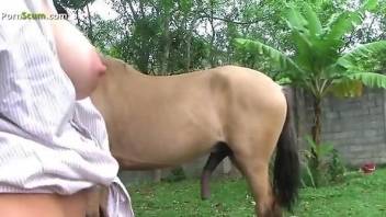 Sexy blonde helps her friend with a stiff horse cock