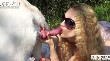 Shades-wearing hottie fucked by a sexy animal here