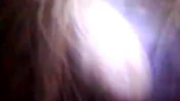 Guy pounding a submissive creature from the rear in the darkness