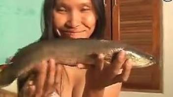 Thai zoophile babe gets her pussy and ass fucked by a fish