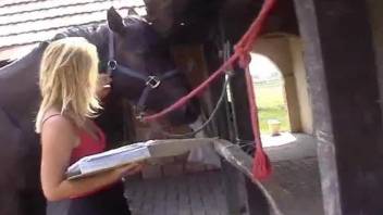 Big boobs blonde gets screwed by a sexy horse